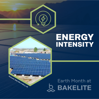 Promotional graphic for Earth Month at Bakelite, showcasing energy intensity. The image features a solar panel installation site in Barry, UK, with solar panels and mountains in the background. An icon with an electric bolt inside a hexagon is displayed above the text 'ENERGY INTENSITY'.
